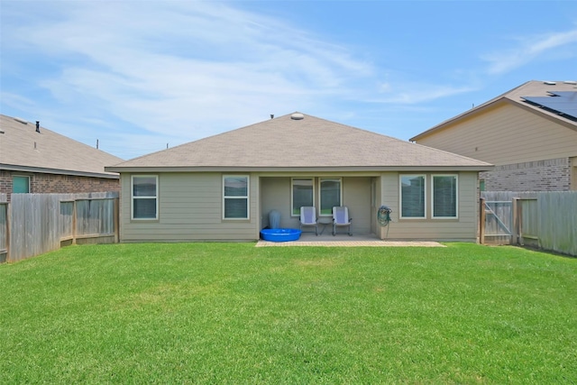 8434 Violet Hills Ln, Rosharon, TX 77583 - back of property with a patio and roof with shingles