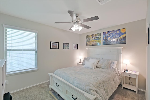 8434 Violet Hills Ln, Rosharon, TX 77583 - carpeted bedroom with multiple windows, baseboards, and ceiling fan