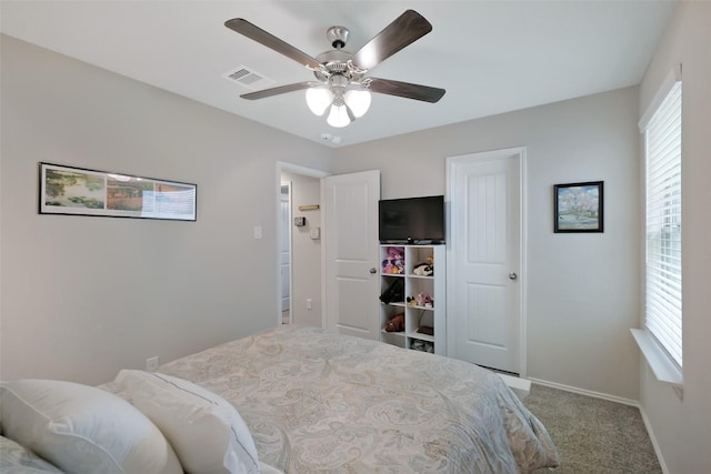 8434 Violet Hills Ln, Rosharon, TX 77583 - carpeted bedroom with baseboards and a ceiling fan