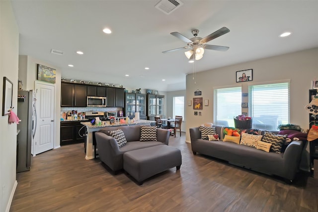 8434 Violet Hills Ln, Rosharon, TX 77583 - living area featuring dark wood-type flooring, ceiling fan, and recessed lighting