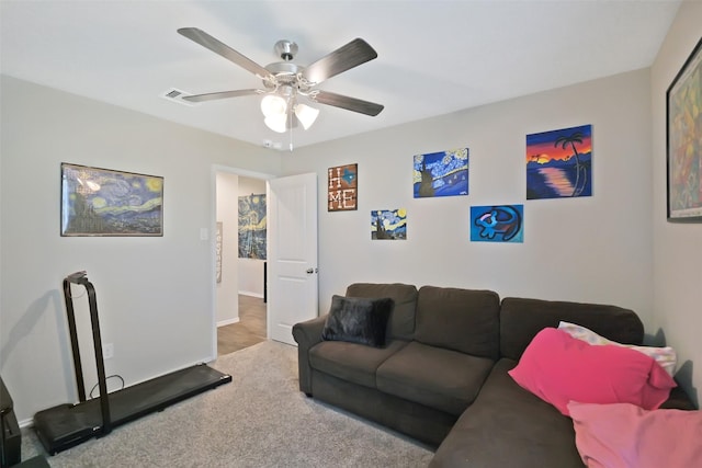 8434 Violet Hills Ln, Rosharon, TX 77583 - living area with ceiling fan, carpet floors, and baseboards