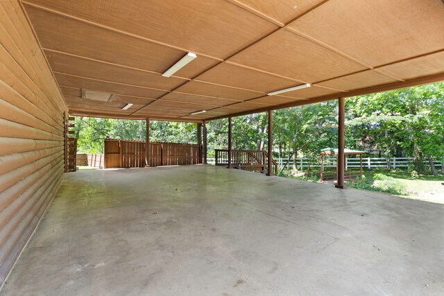 1000 W Polk St, Livingston, TX 77351 - view of patio featuring an attached carport