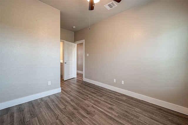 7703 Rainbow Close Ln, Houston, TX 77055 - empty room with a ceiling fan, baseboards, and dark wood-style flooring