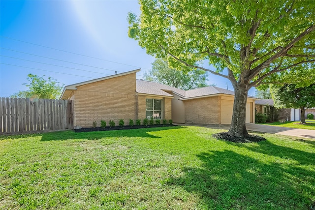 2710 Hazy Creek Dr, Houston, TX 77084 - mid-century inspired home featuring brick siding, a garage, and driveway