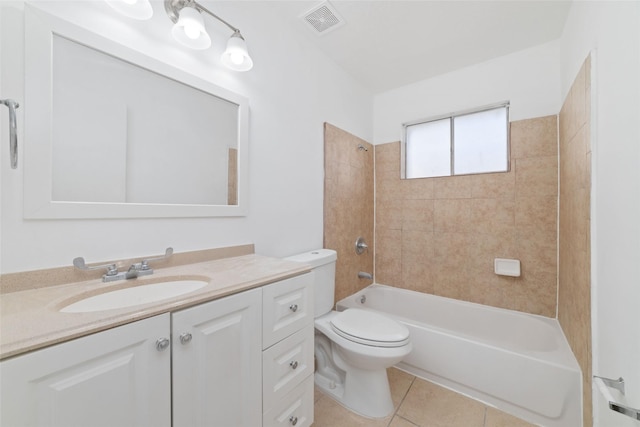 full bath with toilet, vanity, tile patterned floors, and bathing tub / shower combination