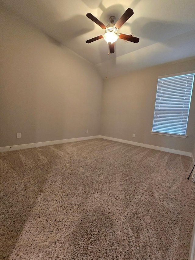 3207 Karleigh Way, Richmond, TX 77406 - empty room with baseboards, a ceiling fan, carpet flooring, and vaulted ceiling