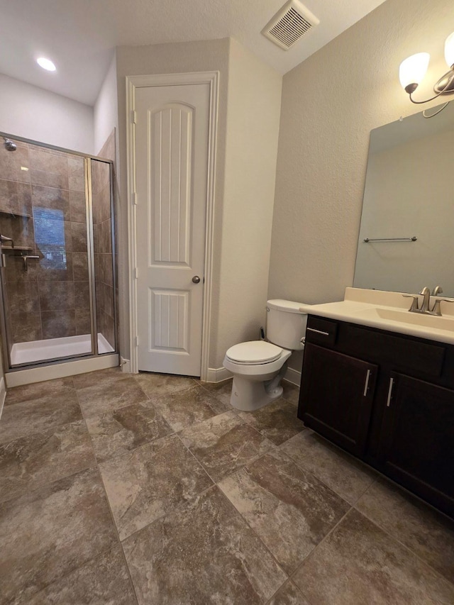 3207 Karleigh Way, Richmond, TX 77406 - bathroom with a shower stall, toilet, and vanity