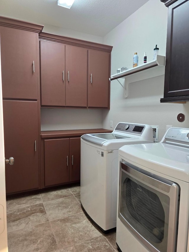 3207 Karleigh Way, Richmond, TX 77406 - laundry area with cabinet space and washer and clothes dryer