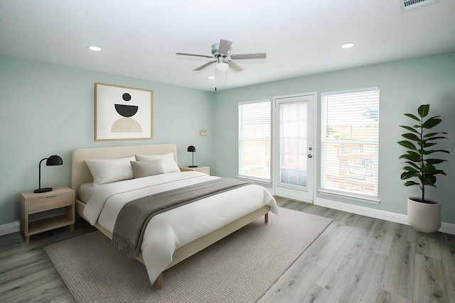 15202 Delbarton Dr, Houston, TX 77083 - bedroom featuring access to exterior, baseboards, wood finished floors, recessed lighting, and a ceiling fan