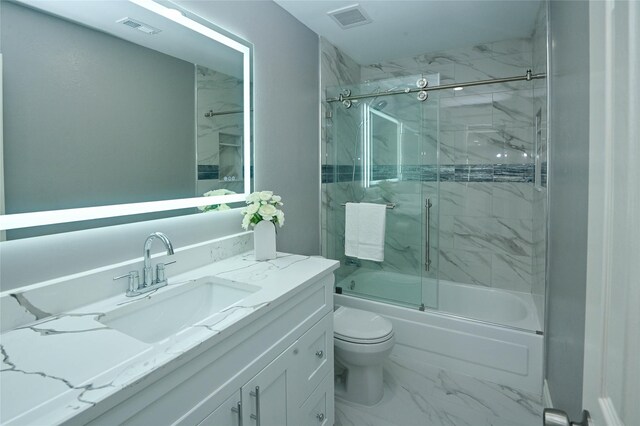 15202 Delbarton Dr, Houston, TX 77083 - bathroom with toilet, bath / shower combo with glass door, marble look tile flooring, and vanity
