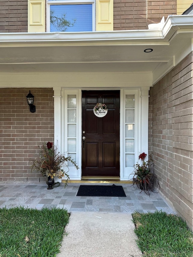 15202 Delbarton Dr, Houston, TX 77083 - view of exterior entry featuring brick siding