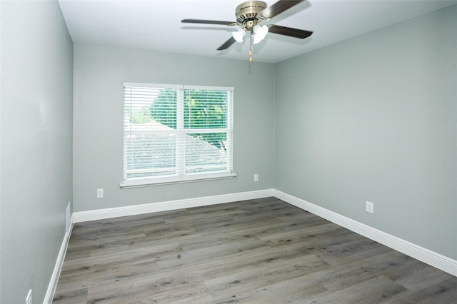 15202 Delbarton Dr, Houston, TX 77083 - empty room featuring wood finished floors, baseboards, and ceiling fan