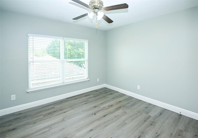 15202 Delbarton Dr, Houston, TX 77083 - unfurnished room featuring wood finished floors, baseboards, and a ceiling fan