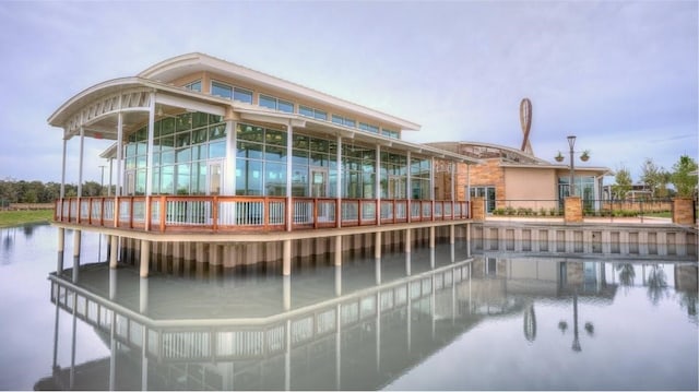 surrounding community with a water view