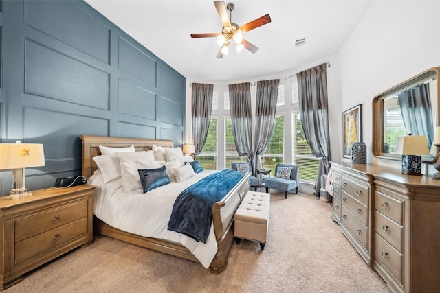 3607 Brook St, Rosharon, TX 77583 - bedroom featuring a decorative wall, light carpet, and a ceiling fan
