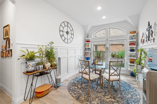3607 Brook St, Rosharon, TX 77583 - dining area with vaulted ceiling, wainscoting, a decorative wall, and recessed lighting