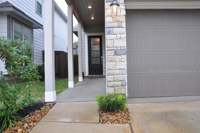 673 Royal Arch Dr, Conroe, TX 77304 - property entrance featuring stone siding