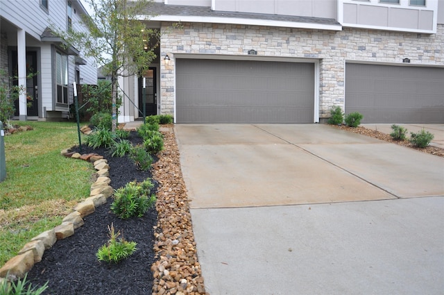 673 Royal Arch Dr, Conroe, TX 77304 - garage with concrete driveway