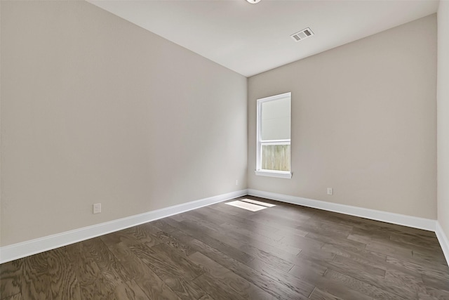 12638 Silver Winter Trl, Houston, TX 77014 - unfurnished room featuring baseboards and dark wood-type flooring