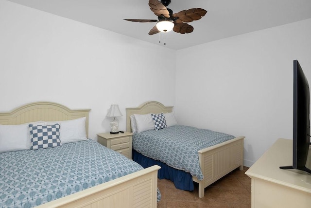 310 Padre Blvd Unit 2305, South Padre Island, TX 78597 - bedroom with tile patterned flooring and a ceiling fan