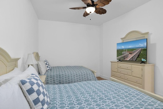310 Padre Blvd Unit 2305, South Padre Island, TX 78597 - bedroom featuring baseboards and ceiling fan