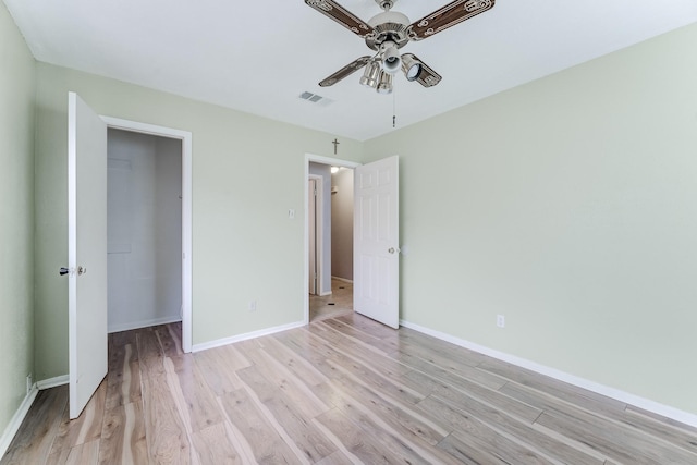 2806 Quail Valley E Dr, Missouri City, TX 77489 - unfurnished bedroom featuring light wood finished floors and baseboards