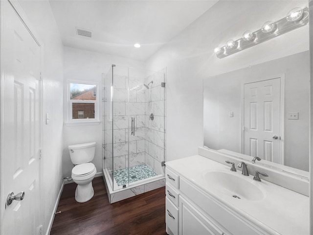 2424 Katy Hockley Cut Off Rd, Katy, TX 77493 - bathroom featuring toilet, wood finished floors, a shower stall, and vanity
