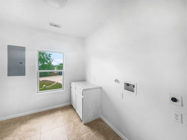 2424 Katy Hockley Cut Off Rd, Katy, TX 77493 - washroom featuring electric dryer hookup, electric panel, cabinet space, hookup for a washing machine, and baseboards