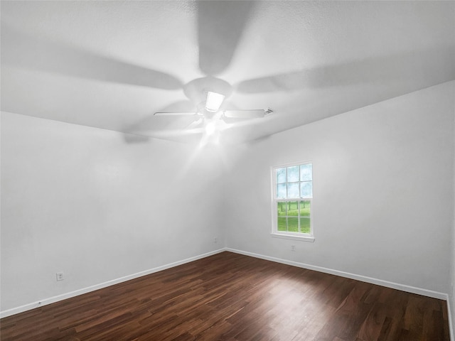 2424 Katy Hockley Cut Off Rd, Katy, TX 77493 - unfurnished room featuring dark wood finished floors, ceiling fan, and baseboards