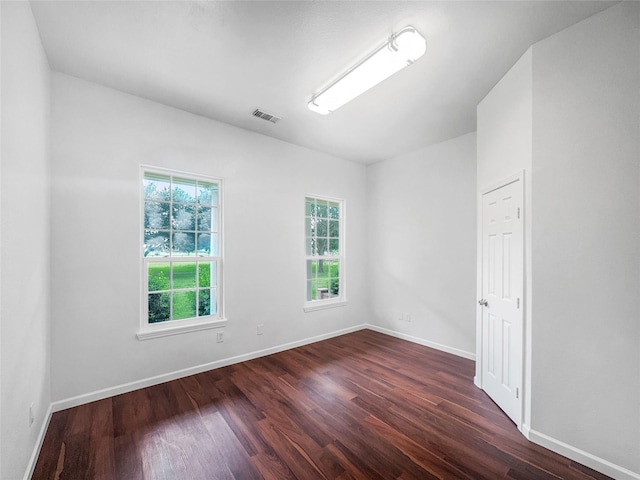 2424 Katy Hockley Cut Off Rd, Katy, TX 77493 - spare room featuring plenty of natural light and dark wood-style flooring