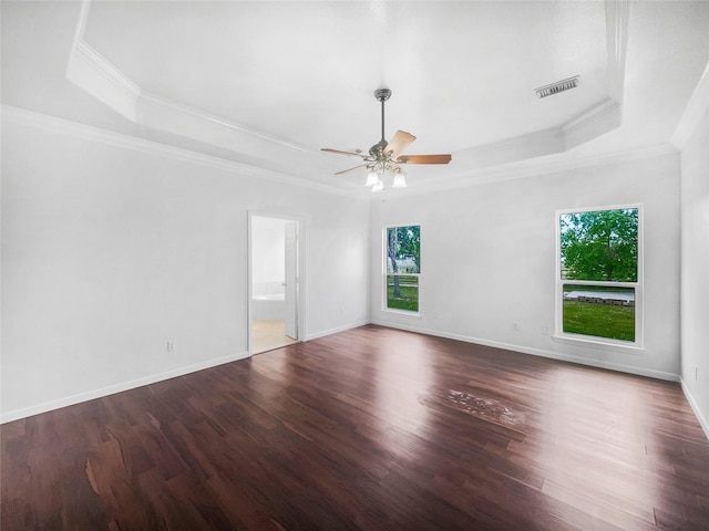 2424 Katy Hockley Cut Off Rd, Katy, TX 77493 - unfurnished room featuring a raised ceiling, ornamental molding, ceiling fan, wood finished floors, and baseboards