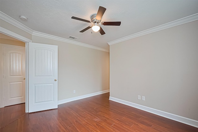 2409 Spears Dr, Humble, TX 77396 - spare room featuring a ceiling fan, wood finished floors, baseboards, a smoke detector, and crown molding