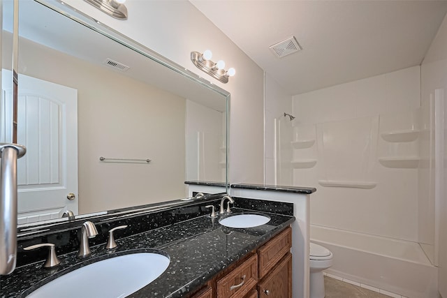 2409 Spears Dr, Humble, TX 77396 - bathroom featuring toilet, tile patterned flooring, double vanity, and washtub / shower combination