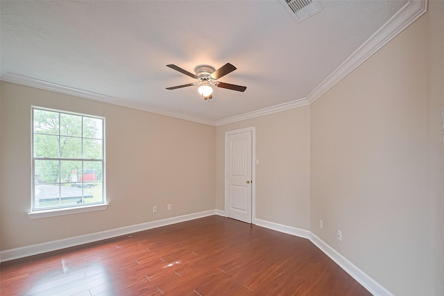 2409 Spears Dr, Humble, TX 77396 - empty room with a ceiling fan, crown molding, dark wood-type flooring, and baseboards