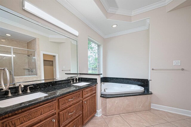 2409 Spears Dr, Humble, TX 77396 - bathroom with a stall shower, a garden tub, tile patterned flooring, crown molding, and double vanity