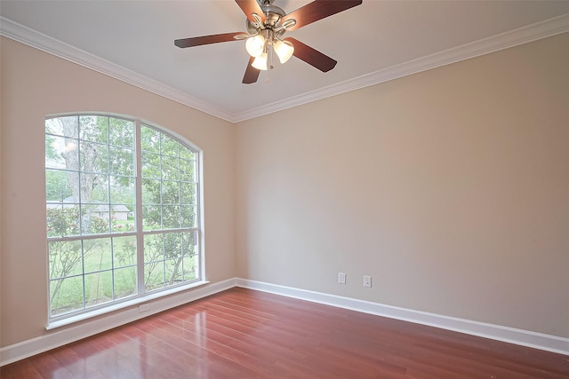 2409 Spears Dr, Humble, TX 77396 - unfurnished room with plenty of natural light, baseboards, crown molding, dark wood-style flooring, and a ceiling fan