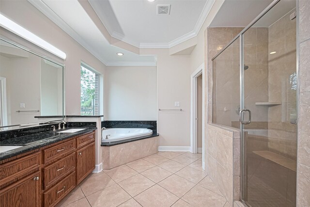 2409 Spears Dr, Humble, TX 77396 - full bathroom featuring ornamental molding, a garden tub, a stall shower, tile patterned floors, and double vanity