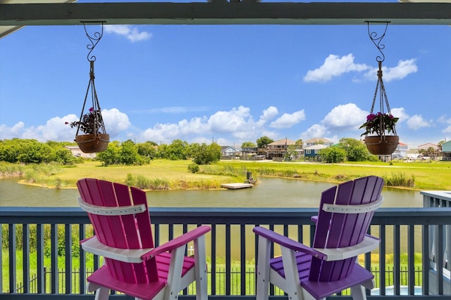 1623 25th St, Dickinson, TX 77539 - wooden terrace with a water view