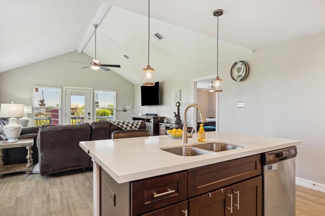 1623 25th St, Dickinson, TX 77539 - kitchen with a sink, dishwasher, light wood-style floors, and open floor plan