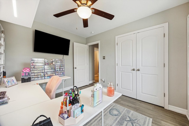 1623 25th St, Dickinson, TX 77539 - office featuring ceiling fan, wood finished floors, and baseboards