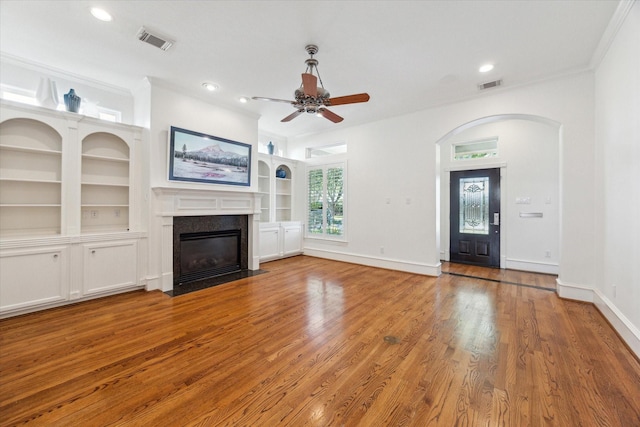 4012 Ruskin St, Houston, TX 77005 - unfurnished living room featuring a ceiling fan, a fireplace with flush hearth, crown molding, light wood-style flooring, and recessed lighting