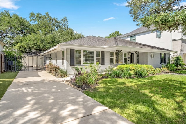 4030 Grennoch Ln, Houston, TX 77025 - view of front of home featuring brick siding, a gate, driveway, and a shingled roof