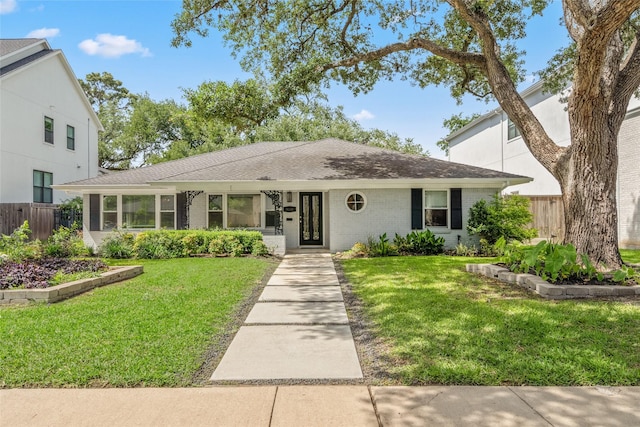 4030 Grennoch Ln, Houston, TX 77025 - view of front of house with brick siding and roof with shingles