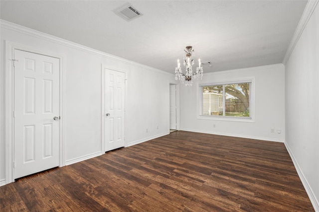4030 Grennoch Ln, Houston, TX 77025 - empty room featuring a chandelier, dark wood finished floors, ornamental molding, and baseboards