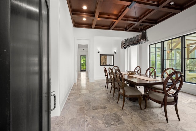 129 Stagecoach Cir, Huntsville, TX 77340 - dining room featuring coffered ceiling, baseboards, recessed lighting, light stone finish flooring, and wooden ceiling with exposed beams