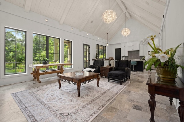 129 Stagecoach Cir, Huntsville, TX 77340 - sunroom featuring a chandelier