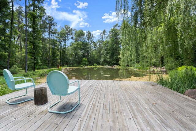 129 Stagecoach Cir, Huntsville, TX 77340 - deck featuring a water view and a view of trees