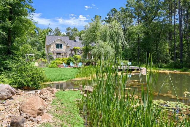129 Stagecoach Cir, Huntsville, TX 77340 - view of yard featuring a water view