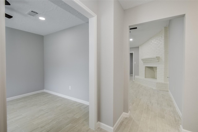 4614 Wee Lassie Ln, Houston, TX 77084 - corridor with light wood-style flooring, baseboards, and recessed lighting