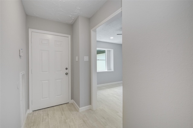 4614 Wee Lassie Ln, Houston, TX 77084 - foyer with light wood-style floors and baseboards